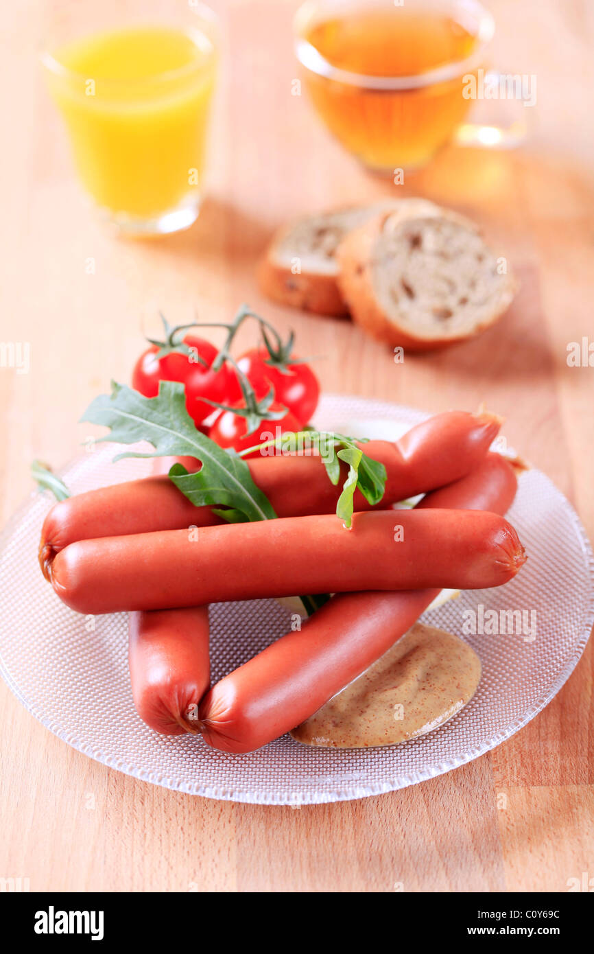 Breakfast of boiled sausages, mustard and bread Stock Photo Alamy