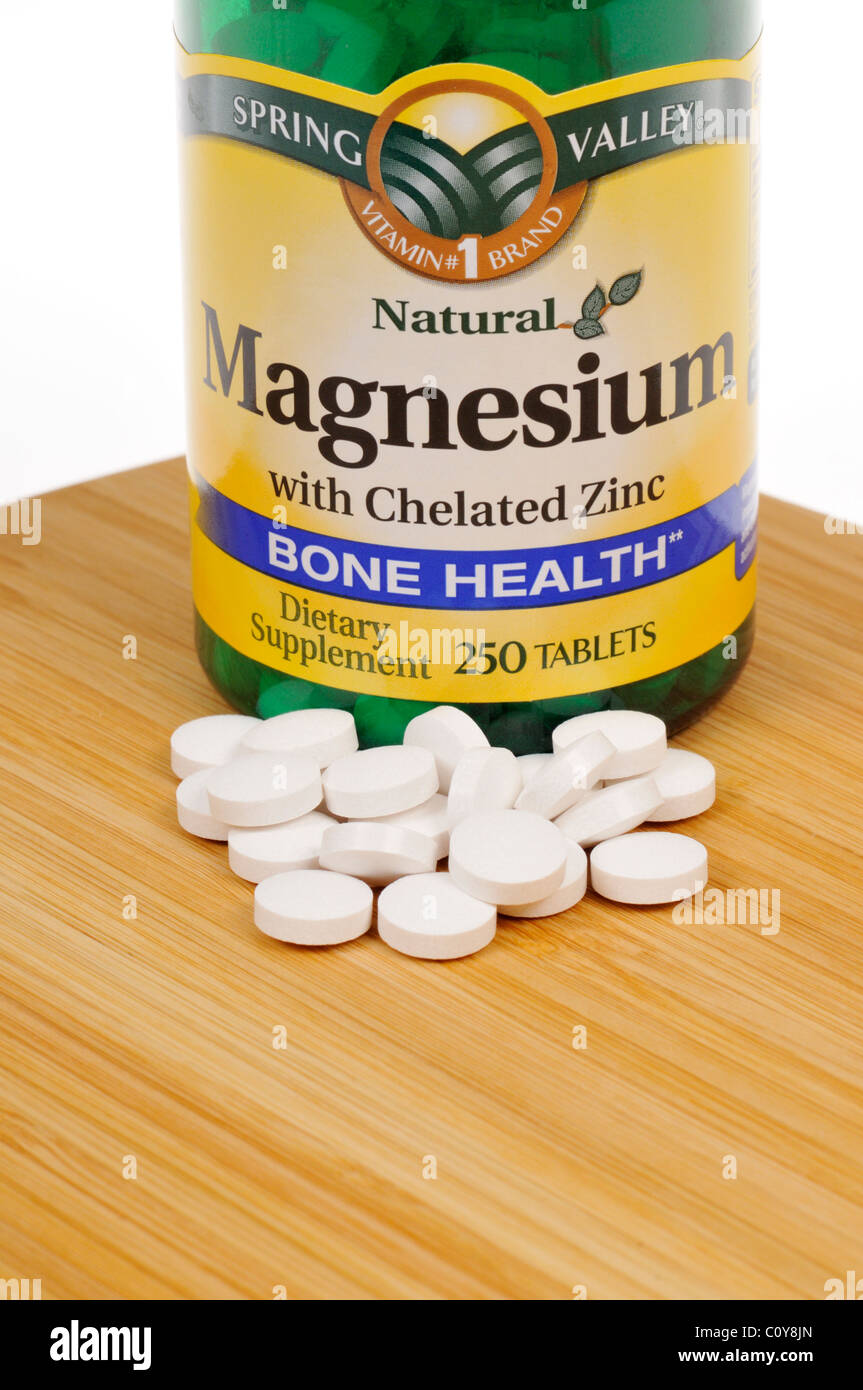Bottle of Spring Valley Magnesium dietary supplement with tablets