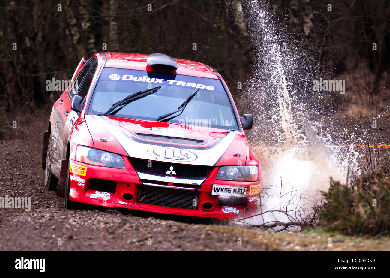 Mitsubishi Evo running through the Wareham Stage of the Sunseeker Rally 2011 Stock Photo