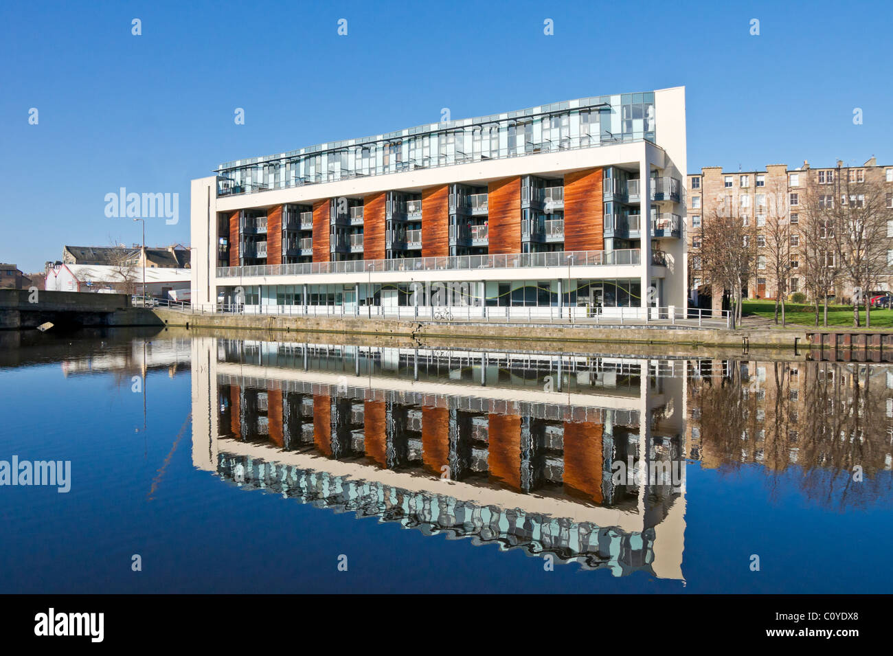 Waterside apartments on Ronaldson's Wharf by Water of Leith in Leith Edinburgh Scotland Stock Photo