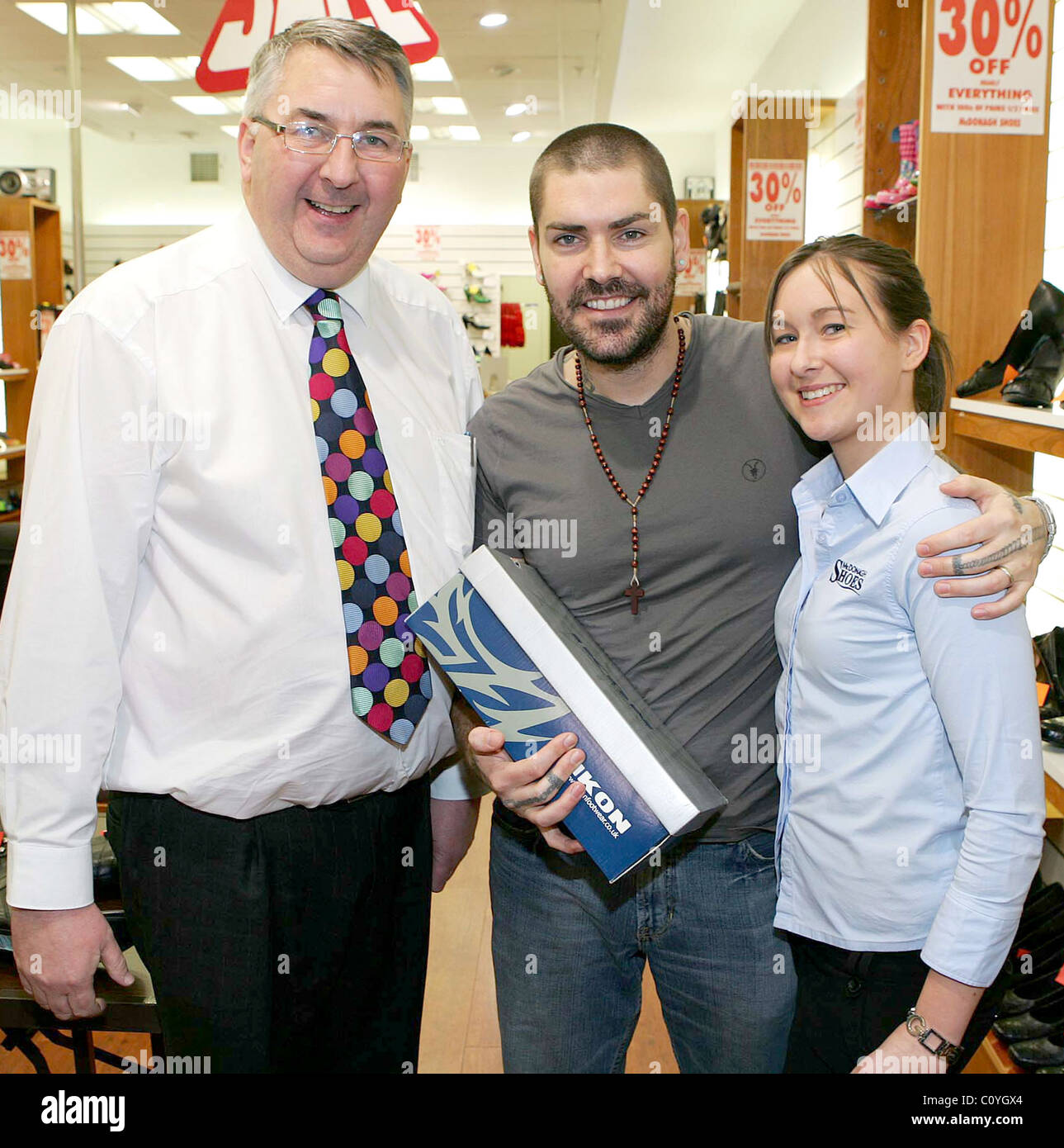 Shane Lynch of Boyzone receives a pair of shoes by McDonagh Shoes as he attends 'The Rally of the Malls' at the Charlestown Stock Photo
