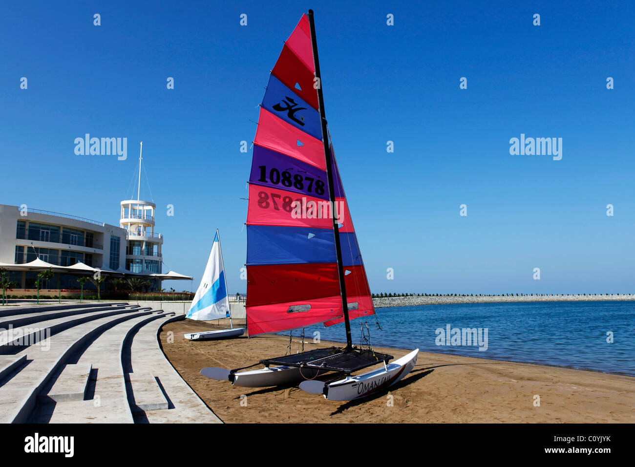 A Hobie 16 Class Catamaran on the beach at the Millennium Hotel at Mussanah, Oman. Stock Photo