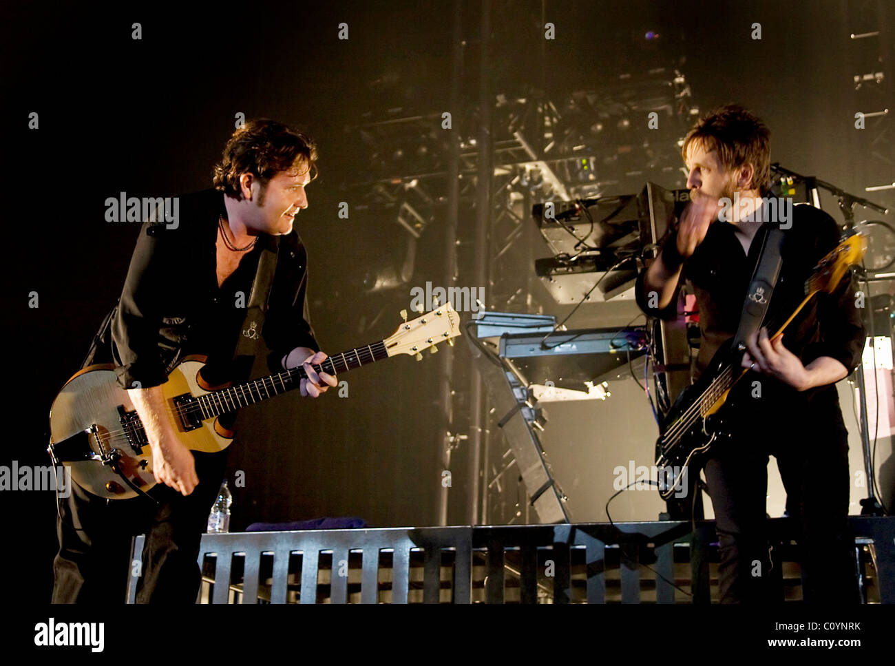 Charlie Burchill and Eddie Duffy of Simple Minds performing on the first night their Anniversary Tour" UK at Stock - Alamy