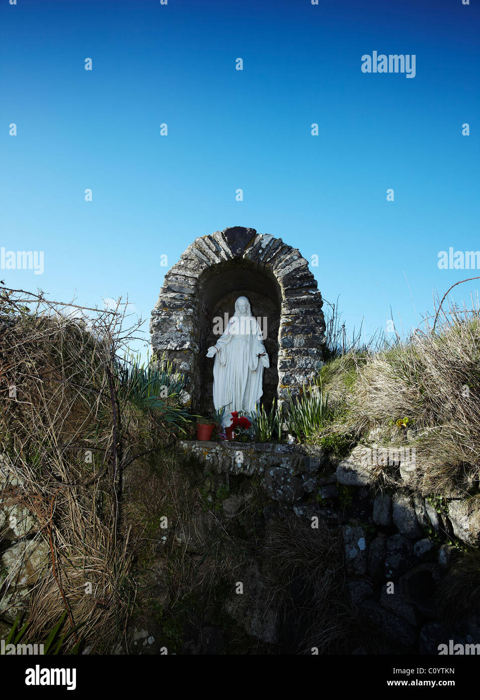 Shrine and Statue of St Non, mother of St David, St Non's Well, near St Davids, Pembrokeshire, Wales, UK Stock Photo
