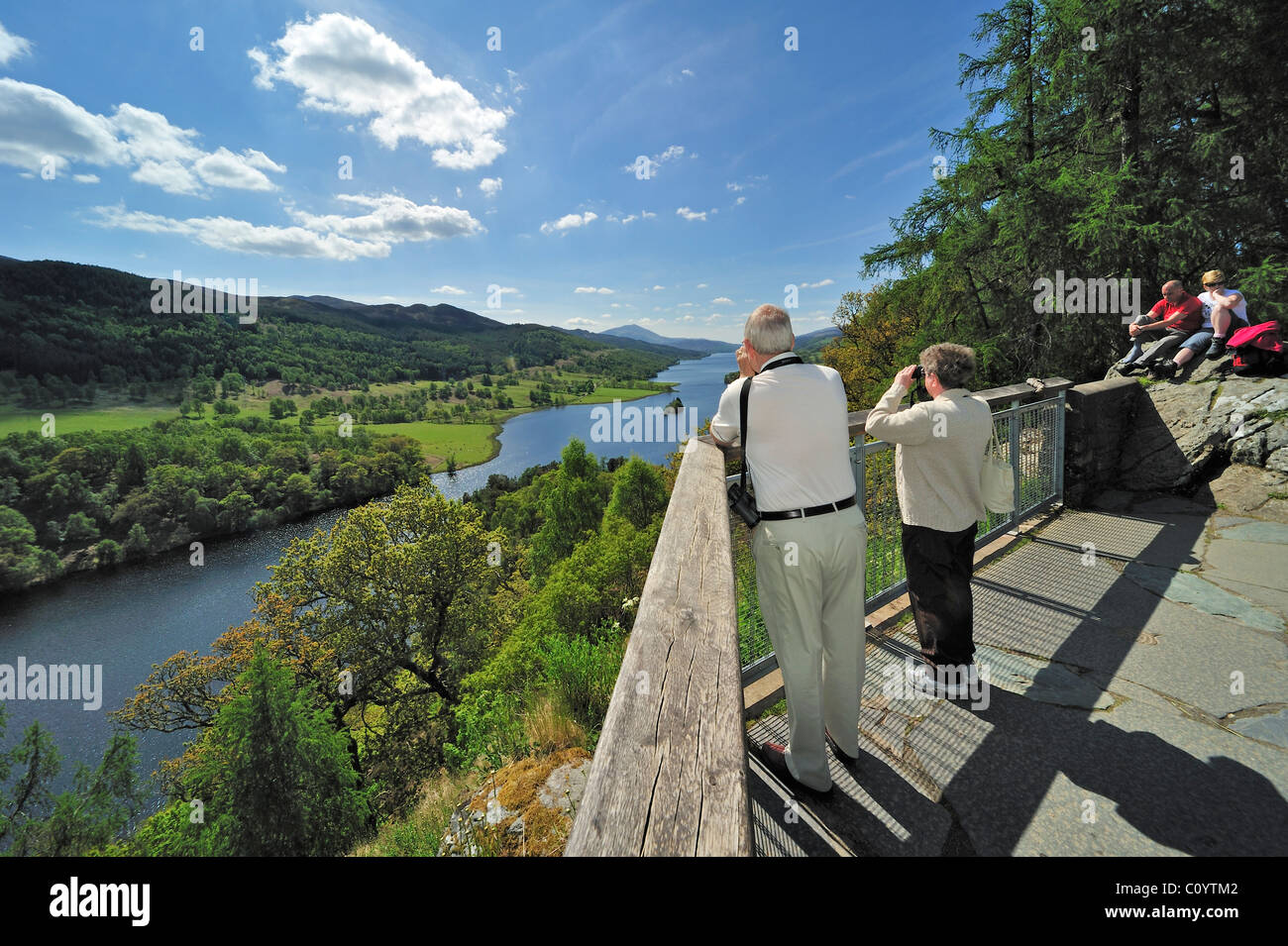 Tourists looking over Loch Tummel from Queen´s View near Pitlochry in Perth and Kinross, Scotland, UK Stock Photo