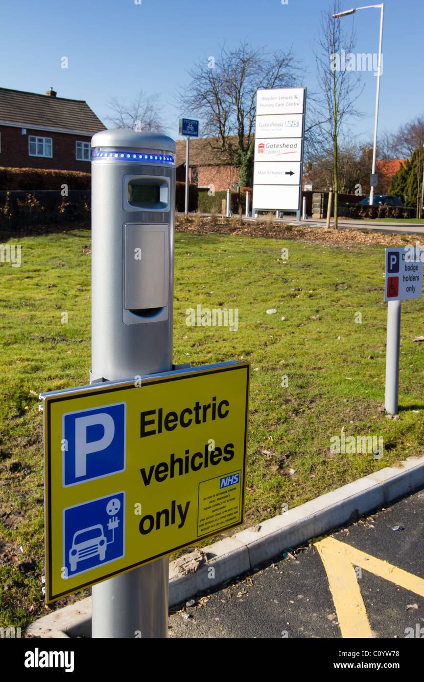Electric car charging point in NHS carpark at Blaydon Primary Care centre. Stock Photo