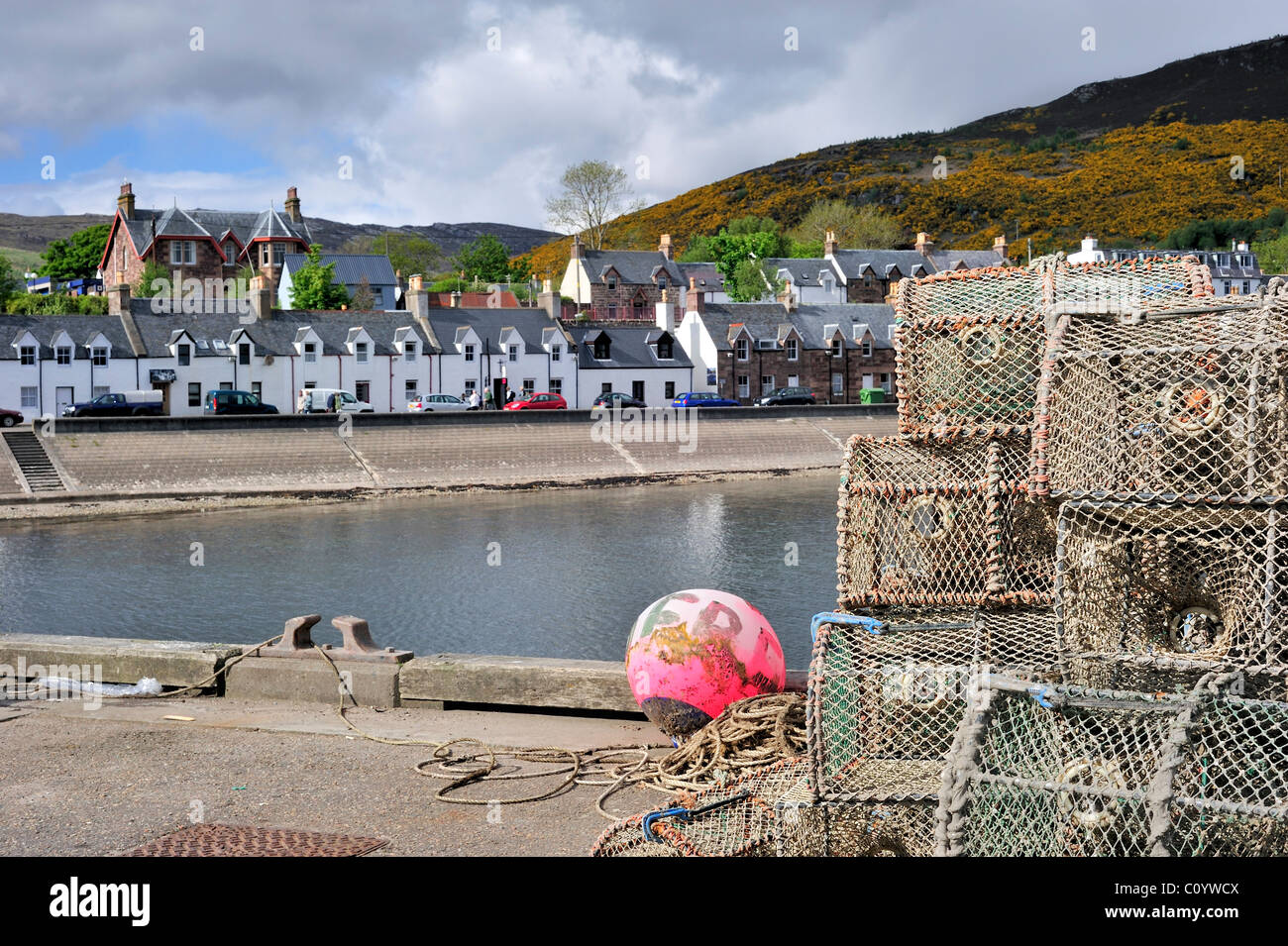 Stacked lobster creels / traps in the Ullapool harbour, Highlands, Scotland, UK Stock Photo