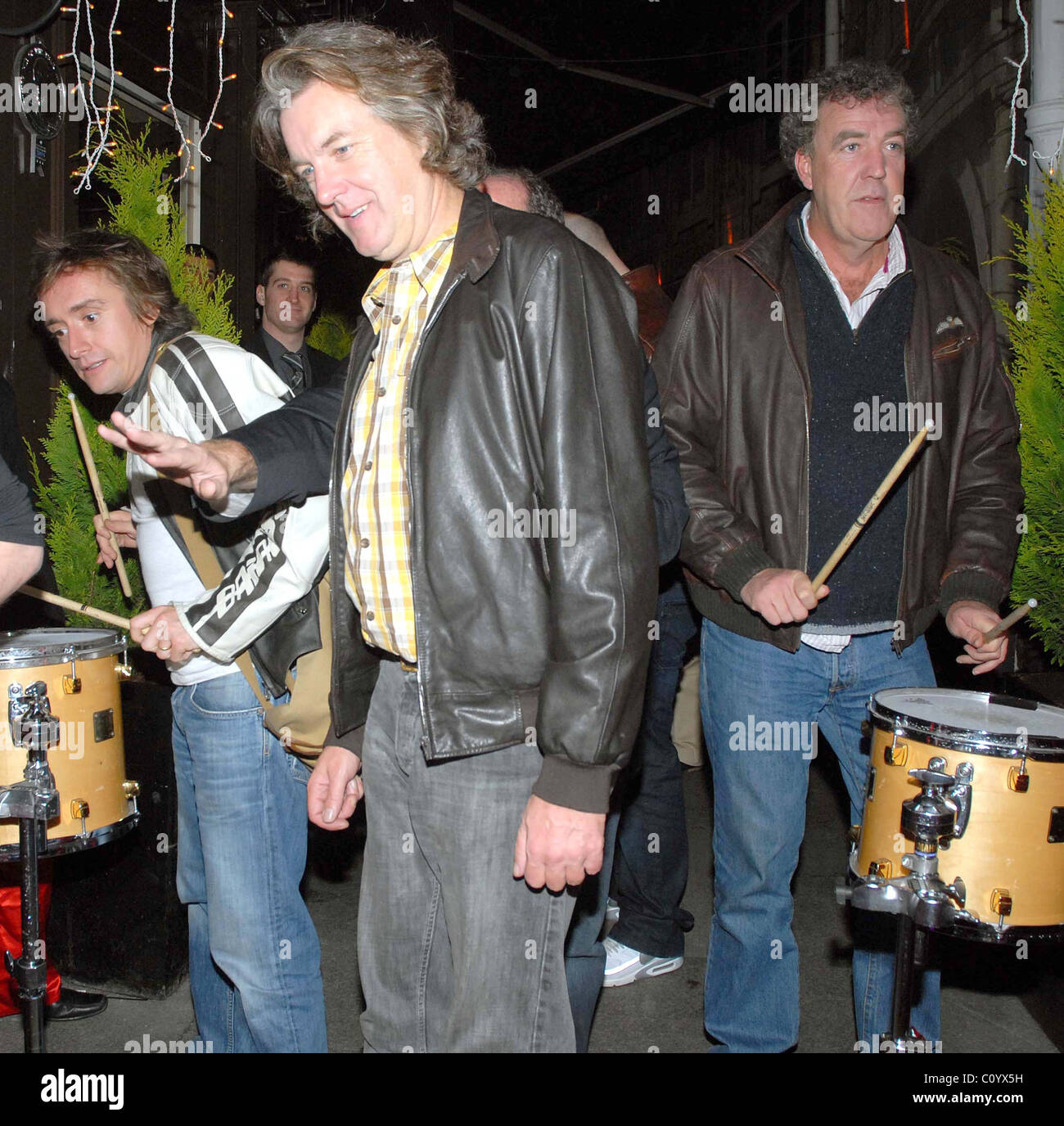 Gear presenters Jeremy Clarkson, Richard Hammond and May arrive at Lillie's nightclub where they took a set Stock Photo - Alamy