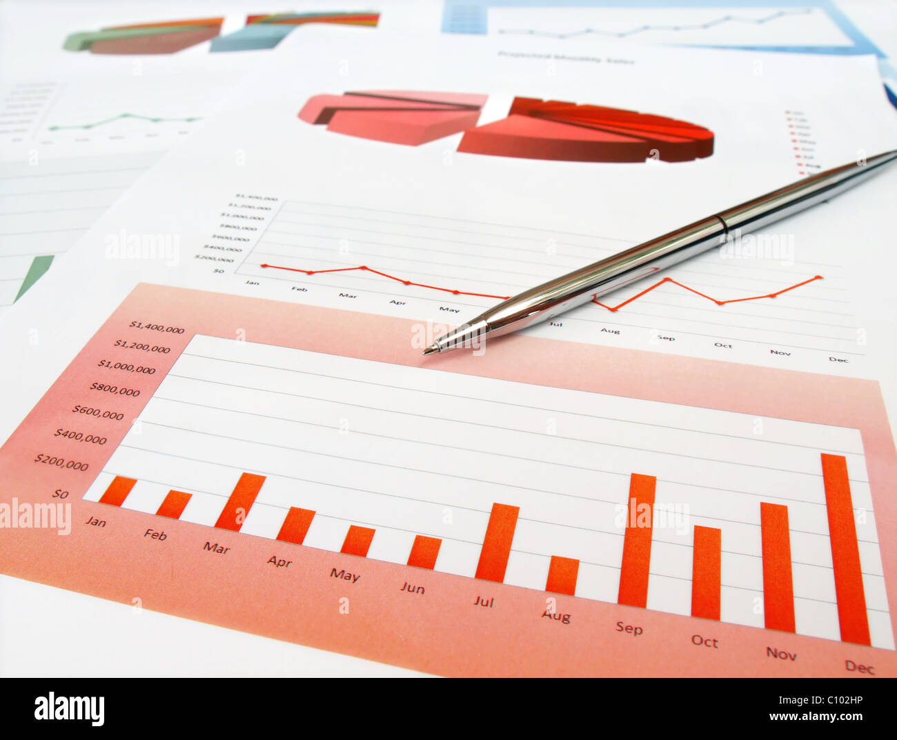 Pen on the investment chart Stock Photo Alamy