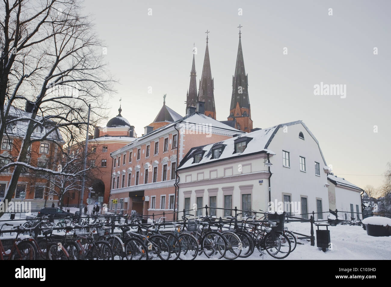 Old part of Uppsala with cathedral and student bicycles. Stock Photo