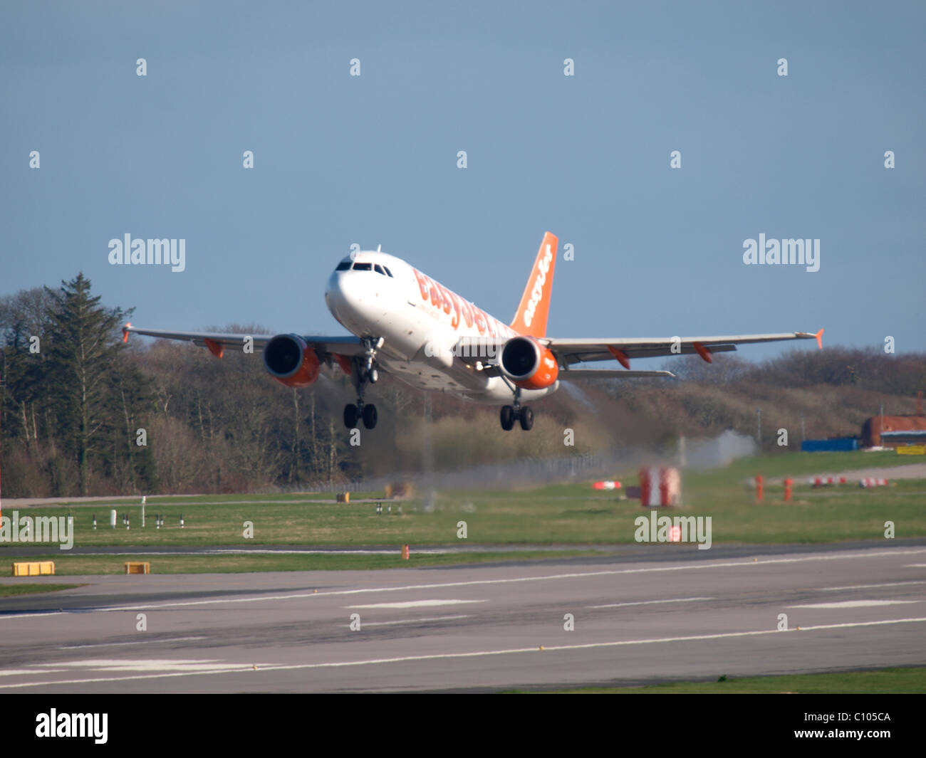 Easyjet plane taking off from Newquay airport, Cornwall, UK Stock Photo
