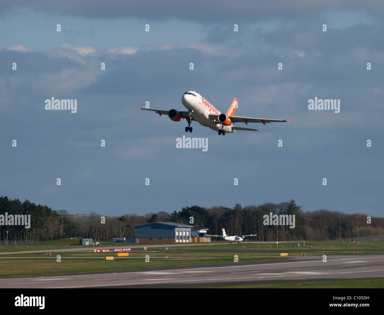 Easyjet plane taking off from Newquay airport, Cornwall, UK Stock Photo