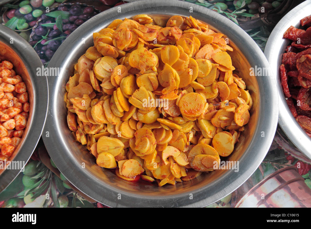 A sweet ginger dish on a Greek food market stall at the street market in Melton Mowbray, Leicestershire, UK. Stock Photo