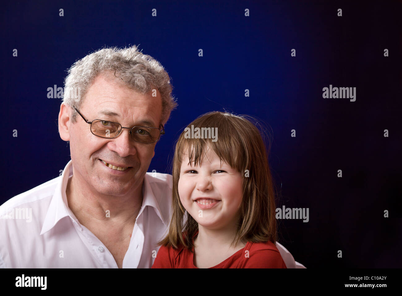 Family Included one mature man and five years old child Stock Photo - Alamy