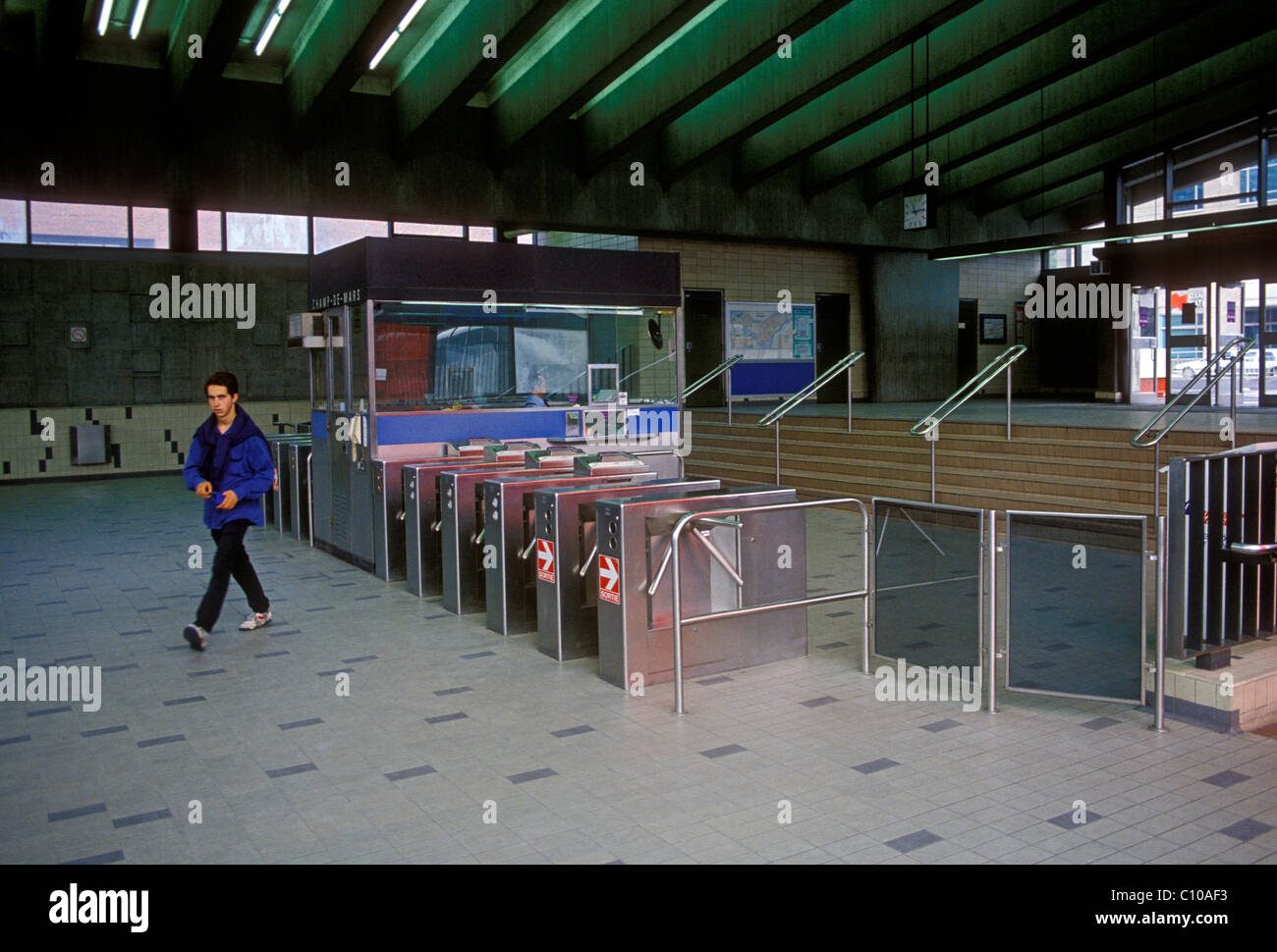 people, passenger, turnstile, turnstiles, Champ-de-Mars metro station, metro station, train station, city of Montreal, Montreal, Canada, North America Stock Photo