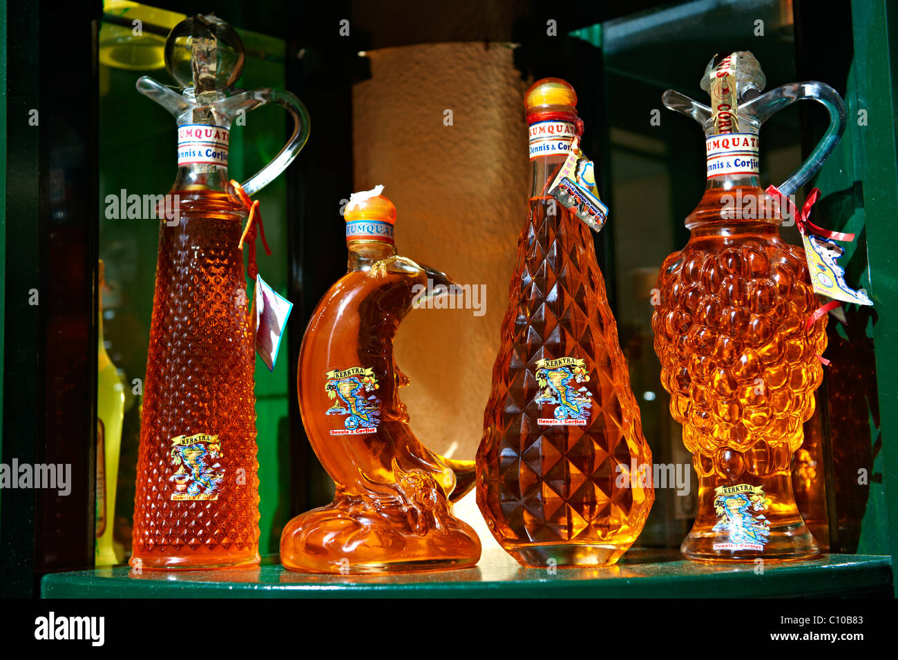 Corfu traditional kumquat liquor bottles Stock Photo