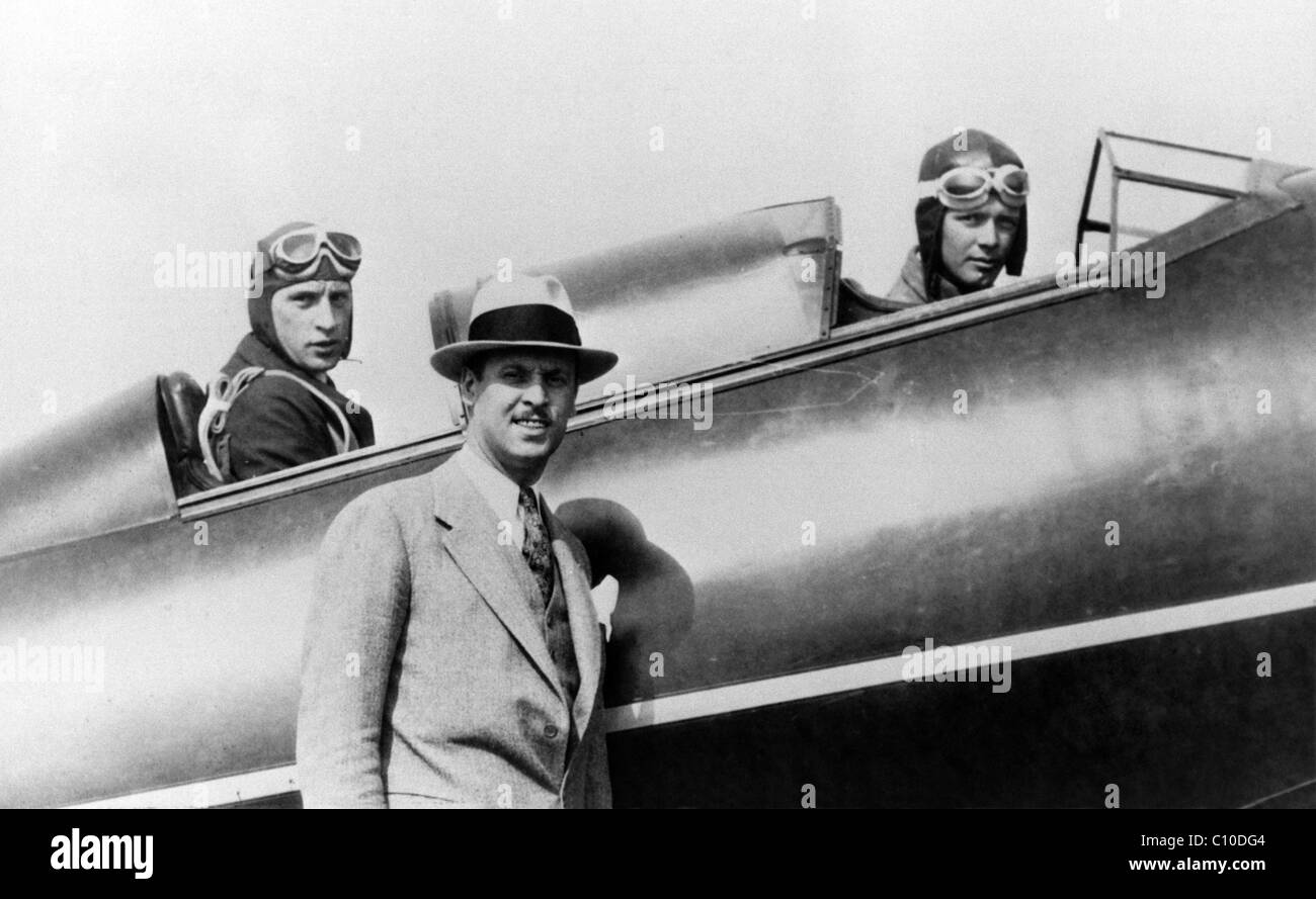 Fred E. Weick, 1925-1929, in rear cockpit. Charles Lindbergh in front. Tom Hamilton is standing. Stock Photo