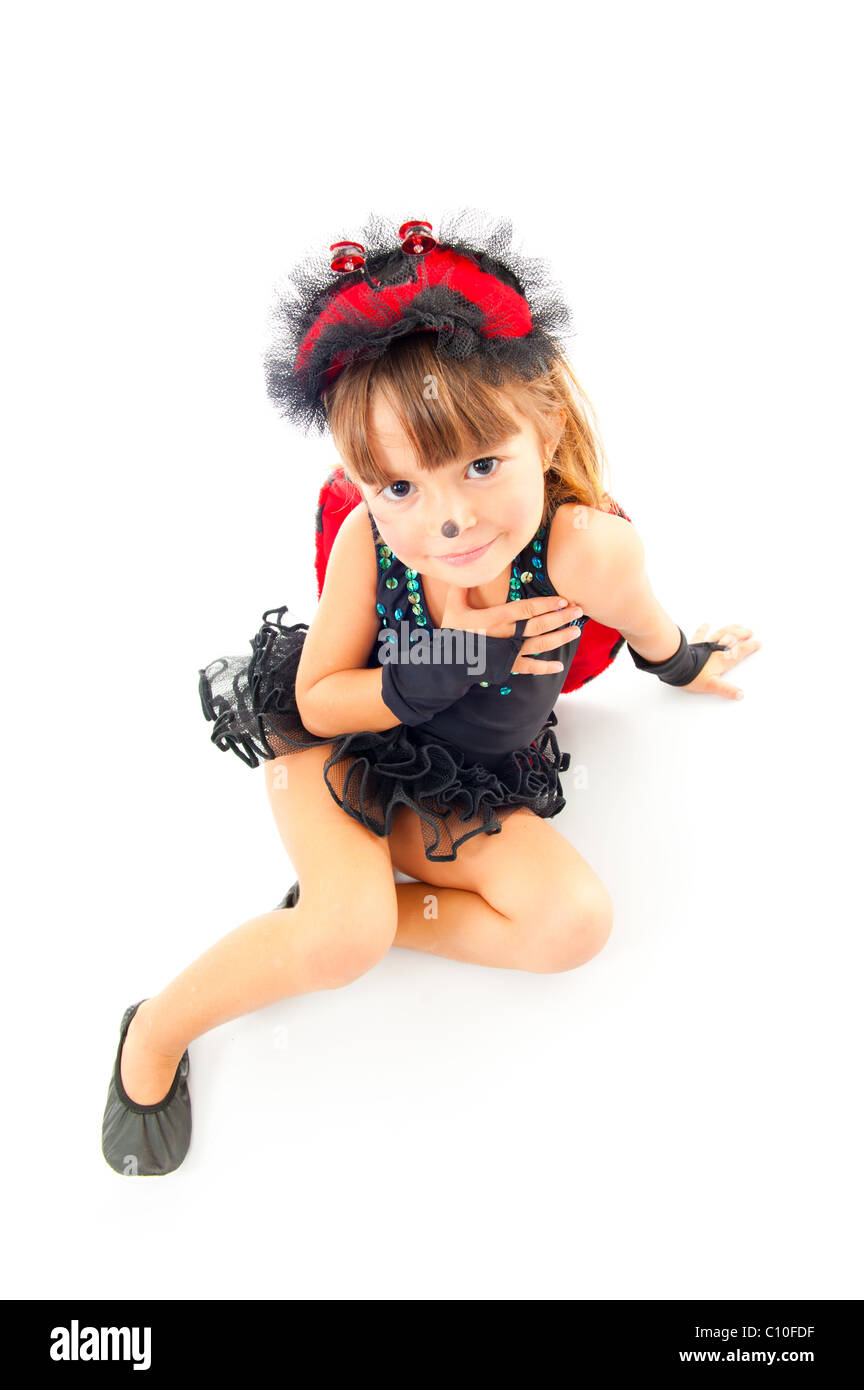Cute child with Ladybug costume party on the floor. Stock Photo