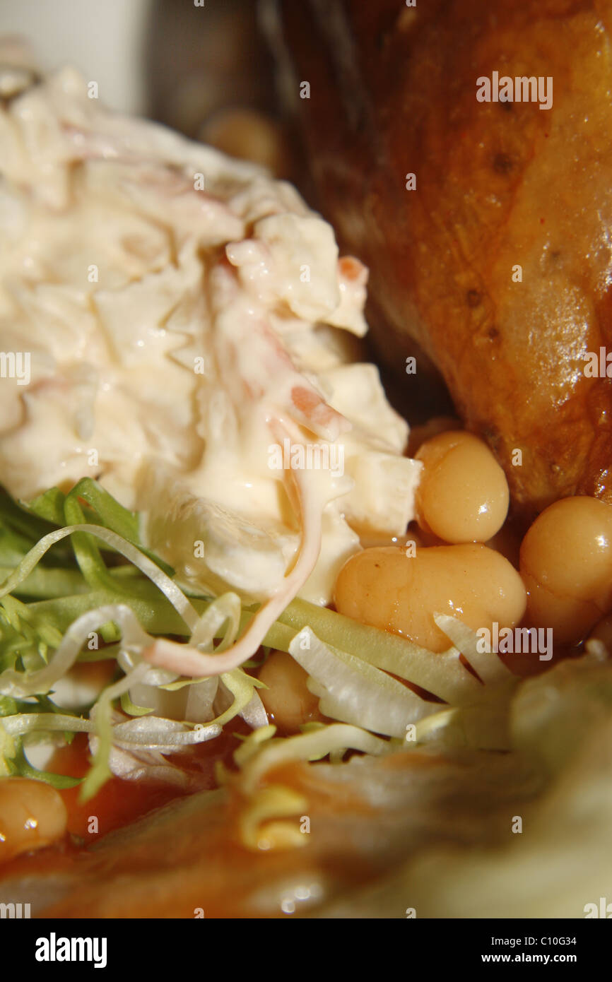 cheese and beans jacket potato with salad Stock Photo Alamy