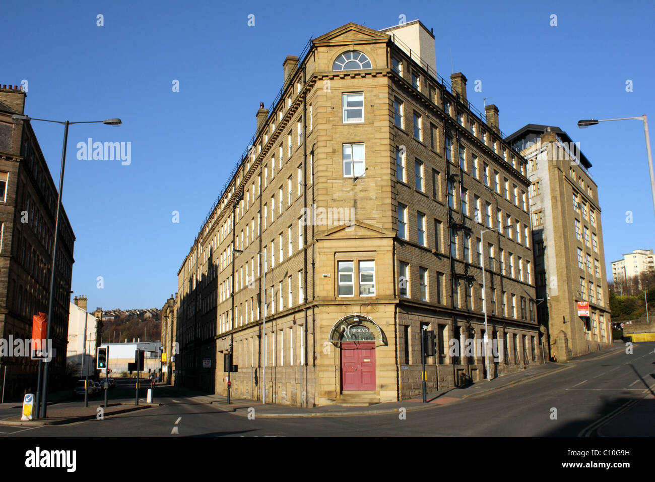 Typical Bradford Mill or warehouse a relic of Bradford Industrial heritage from the wool of textile era Stock Photo