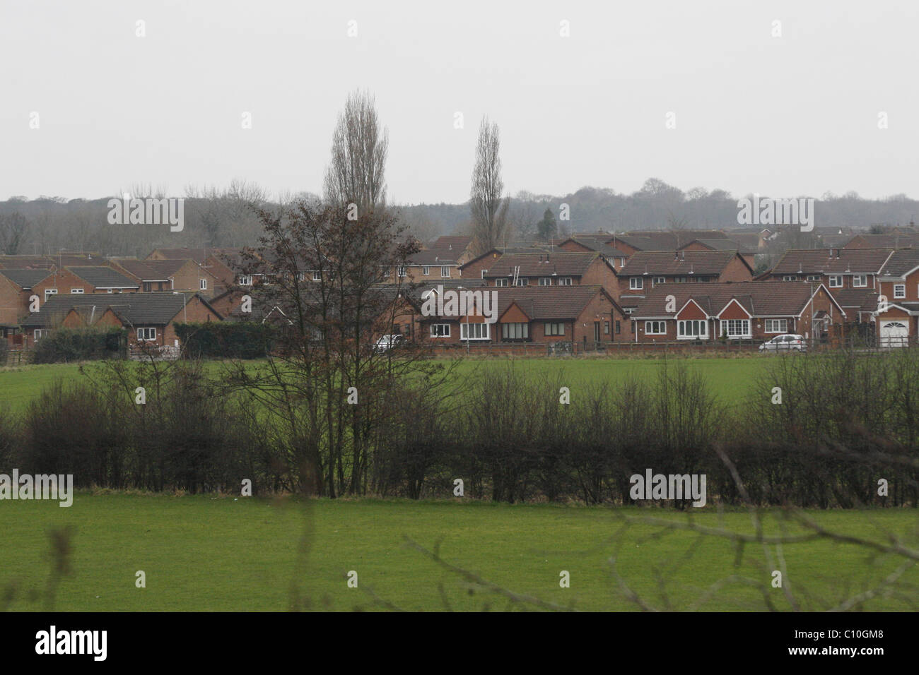 Houses by field hires stock photography and images Alamy