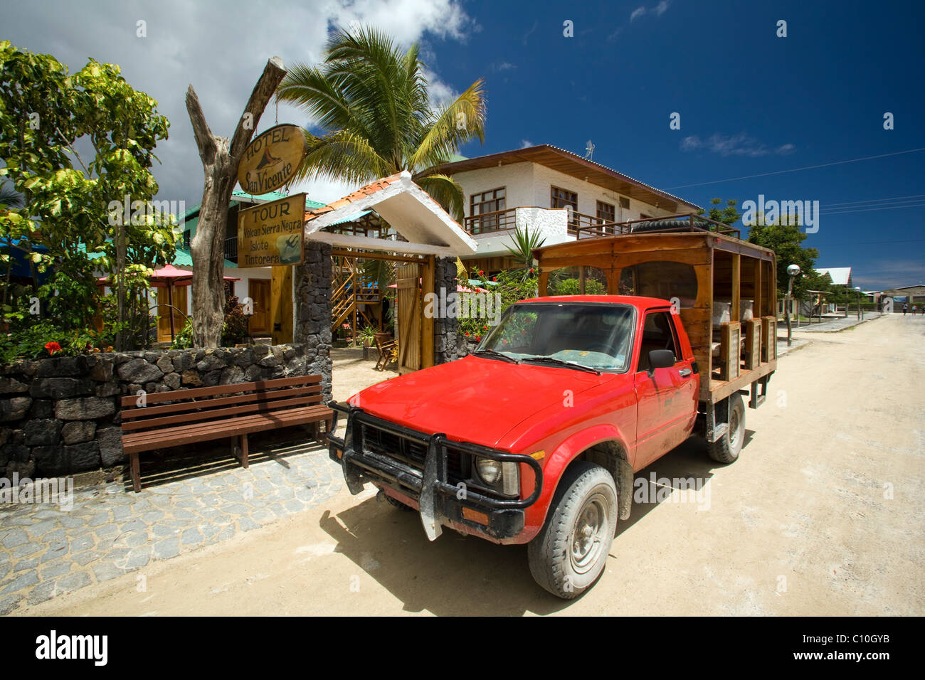 Red Chivas Bus on Isabela Island - Galapagos Islands, Ecuador Stock Photo