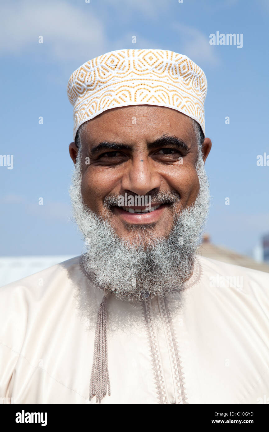 Middle-aged, bearded  Arab Man Smiling Stock Photo