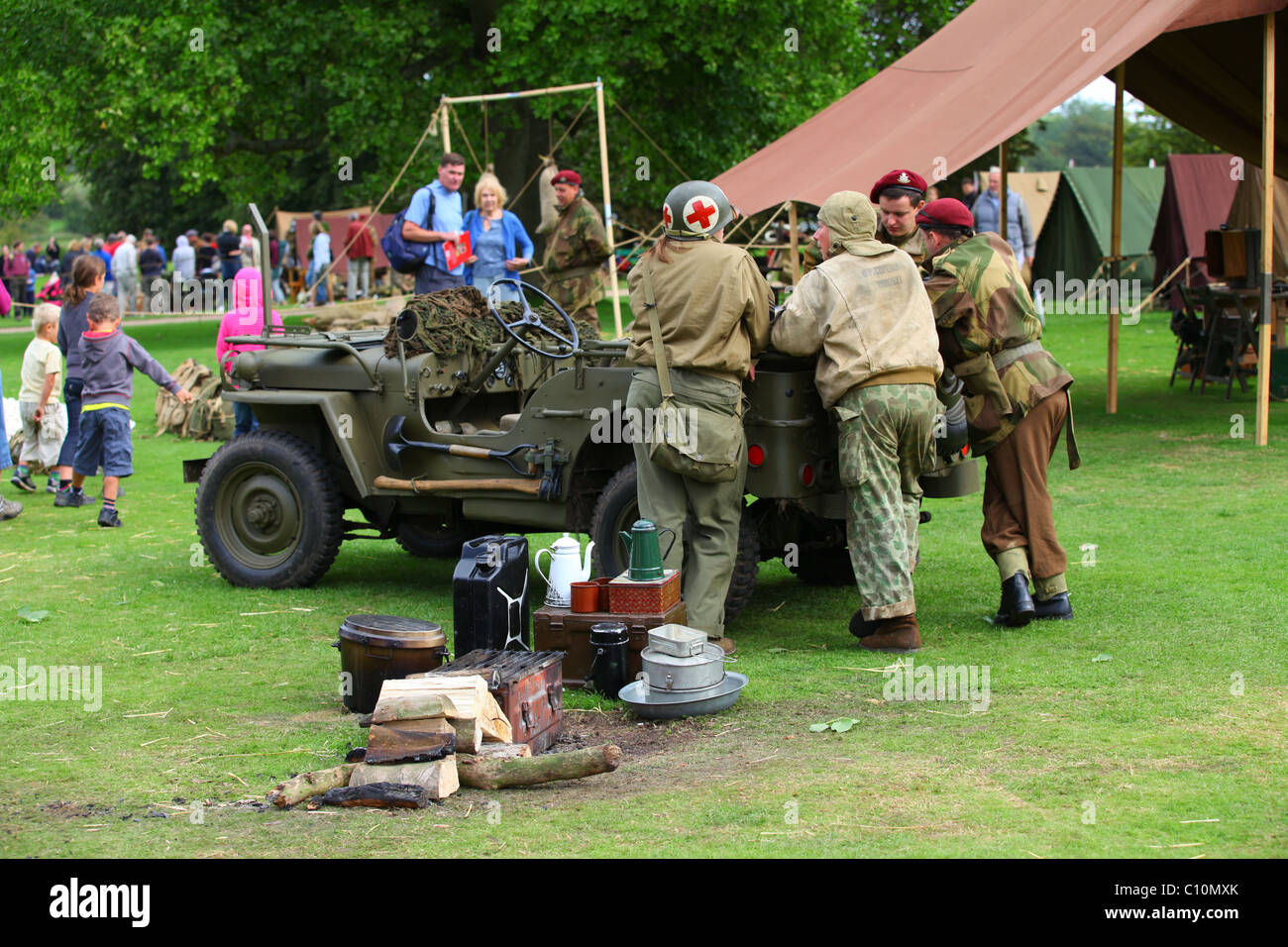 Reconstruction WW2 US Army Jeep with British and American soldiers and Medic Stock Photo