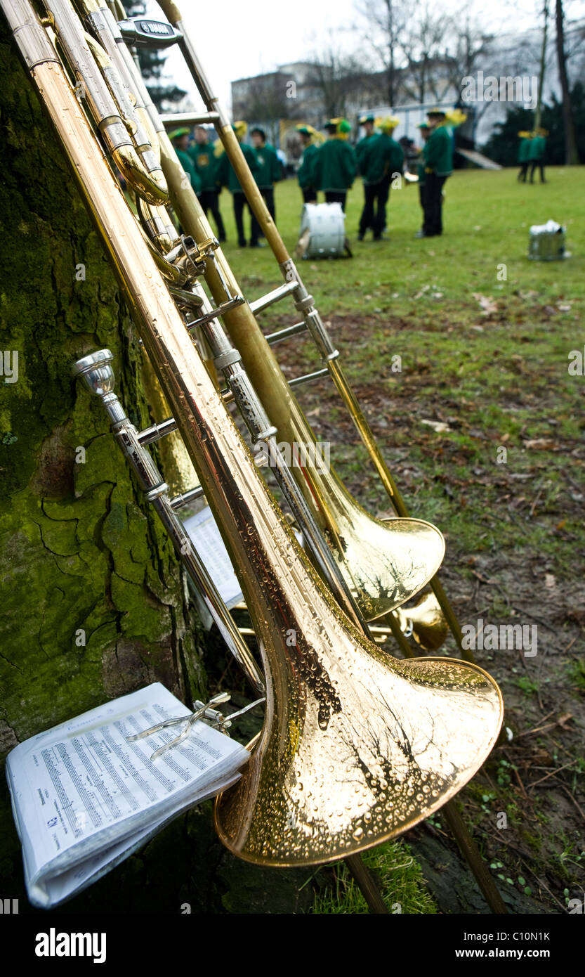 Trombones on the grass during Carnival in Cologne, Germany Stock Photo