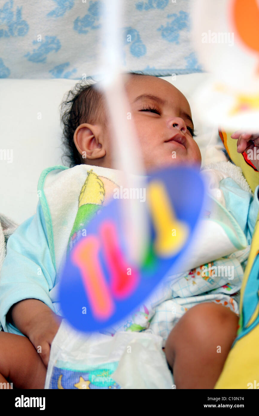 Sleeping baby girl four months old Stock Photo Alamy