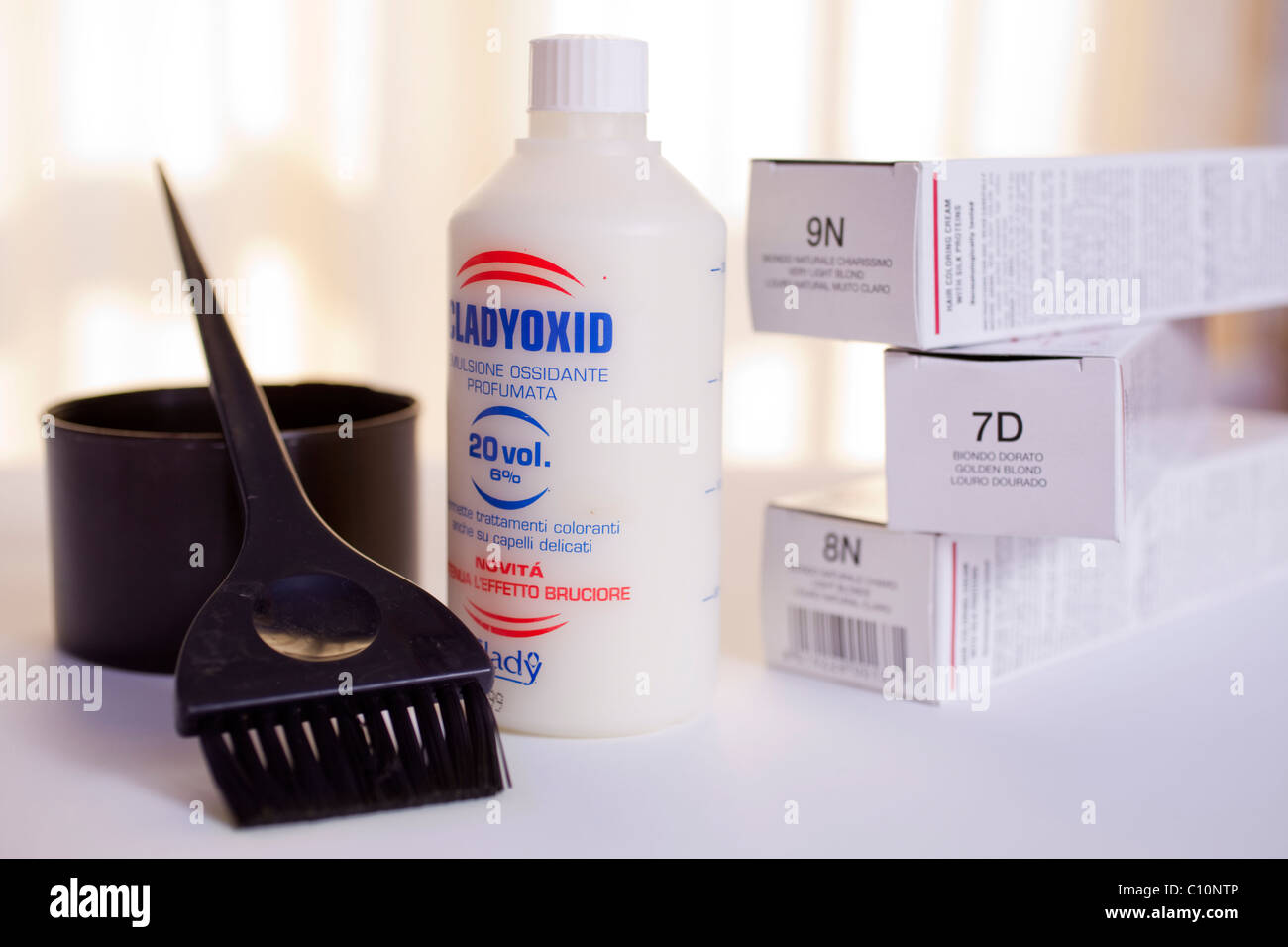 Hair dye cream tubes, peroxide 20 volumes, pot and brush for color