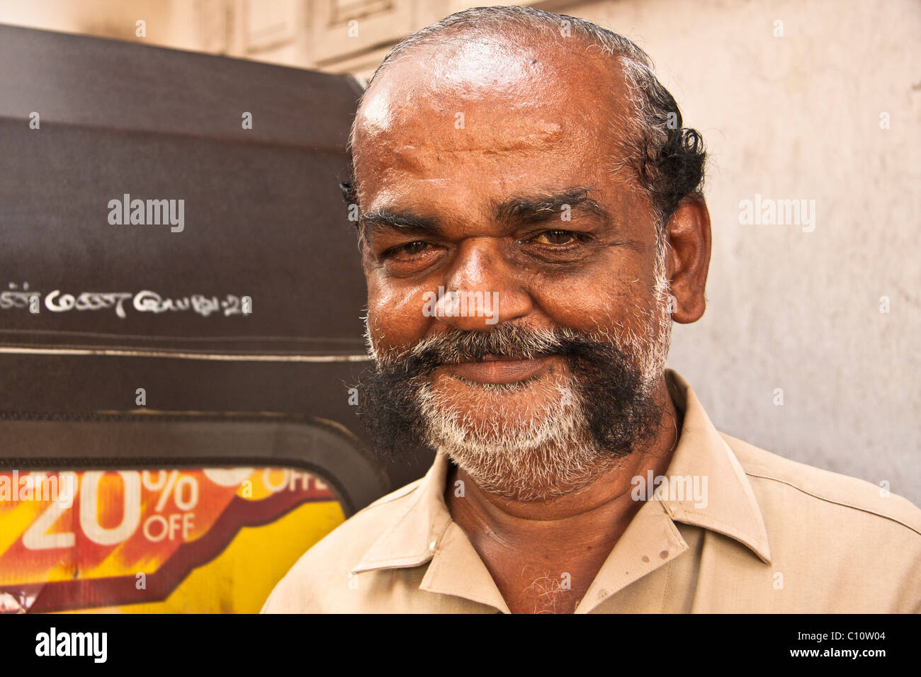 Auto rickshaw driver with black mustache Stock Photo
