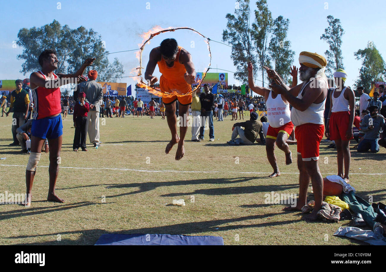 A participant performs during the 74th Kila Raipur rural sports meet Ludhiana, India - 15.02.09 Stock Photo