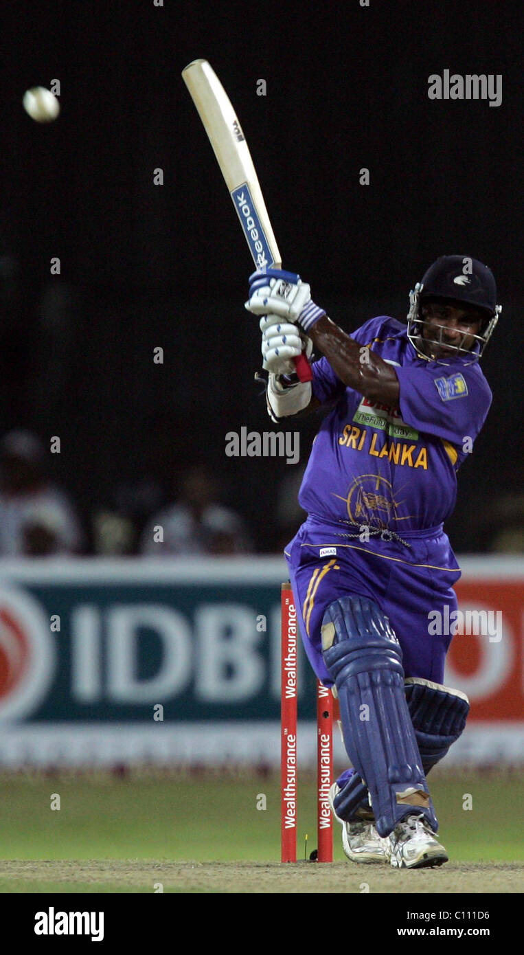 Sri Lankan cricketer Sanath Jayasuriya plays a stroke during the Twenty20 International (ODI) match between India and Sri Lanka Stock Photo