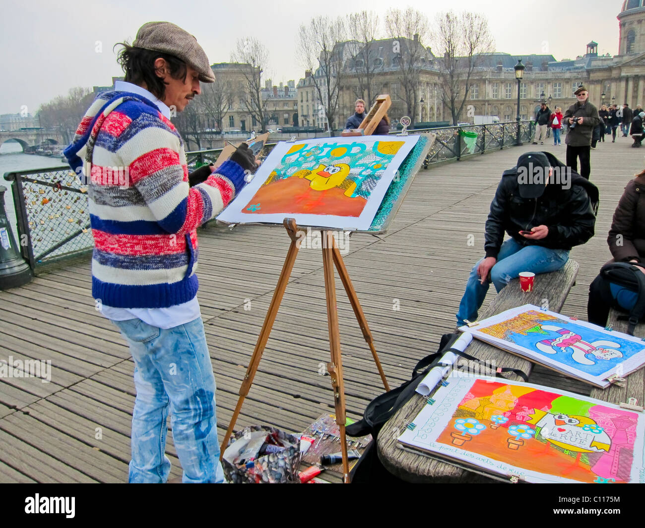 Paris, France, Local Artist, Painter, Working on Bridge on Seine River,  Pont des Arts, paintings man, urban artwork Job Stock Photo - Alamy