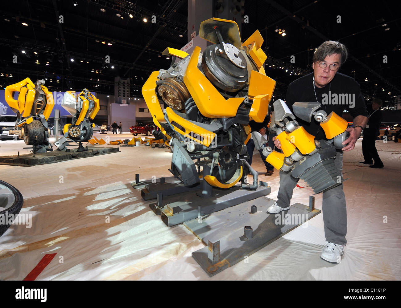 TRANSFORMER TOWERS OVER CAR SHOW This replica of a Transformers Autobot