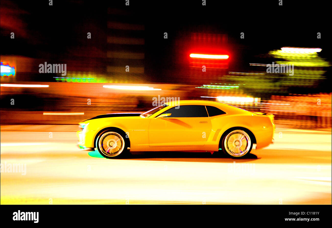 TRANSFORMER TOWERS OVER CAR SHOW This replica of a Transformers Autobot