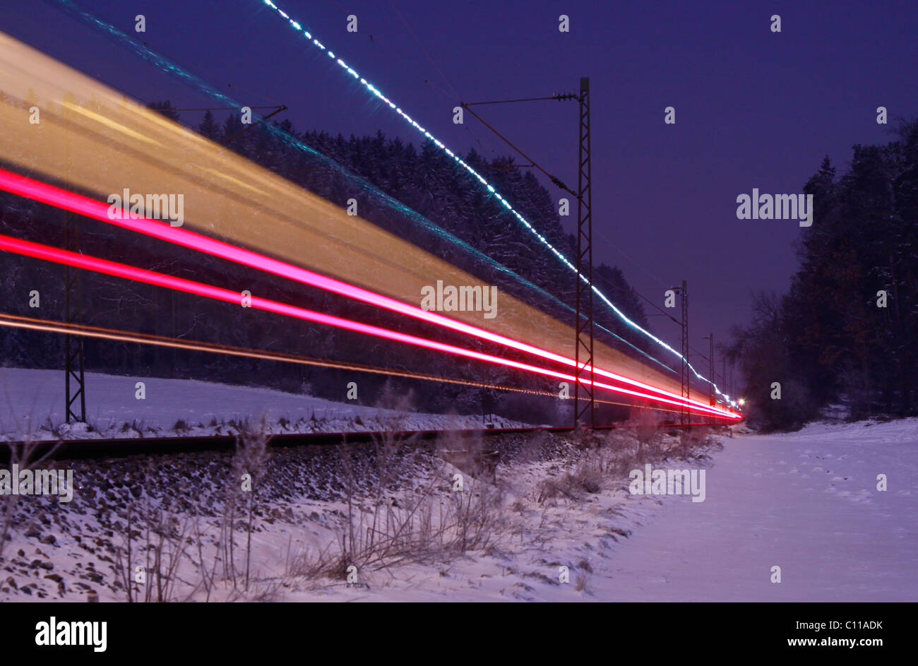 Railway, light trace, winter Stock Photo