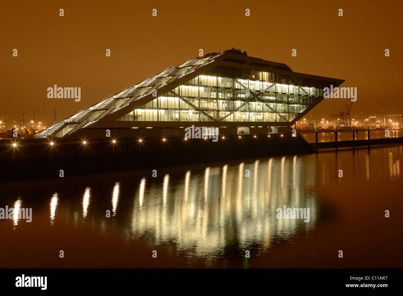 Docklands, glass office building, illuminated at night, Edgar-Engelhard-Kai, port of Hamburg, Hamburg, Germany, Europe Stock Photo