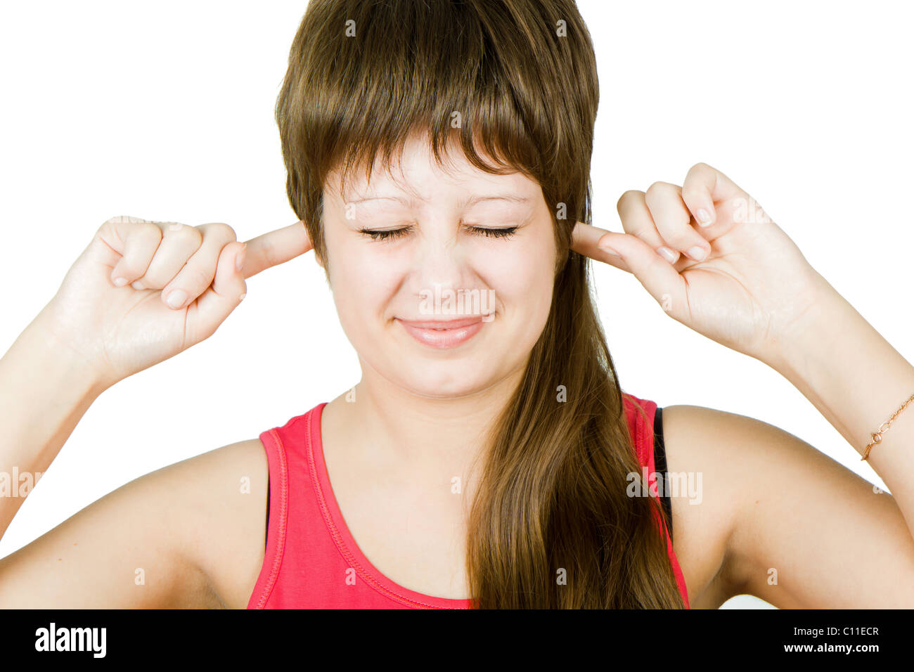 girl stopped up ears with his hands and closed her eyes Stock Photo Alamy