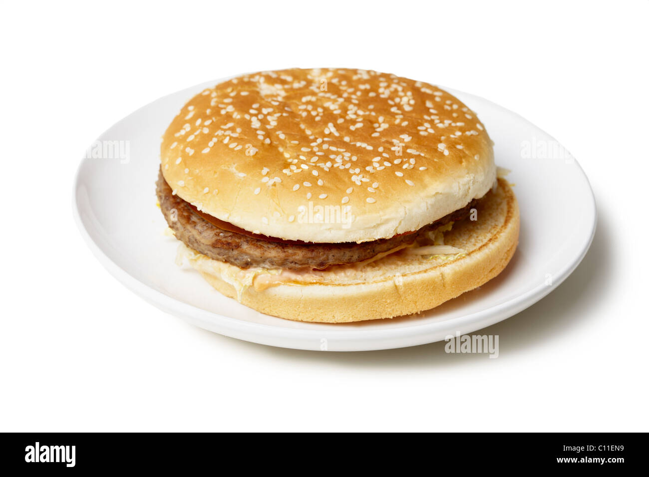 Sandwich - hamburger on plate isolated on white Stock Photo