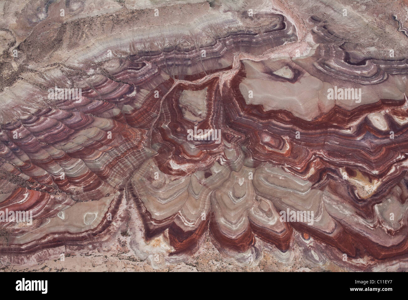 AERIAL VIEW. Desert landscape resembling a banded agate, Located near Caineville, Wayne County, southern Utah, USA. Stock Photo