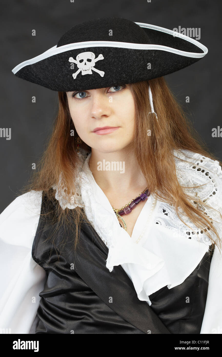 Woman pirate on a black background Stock Photo