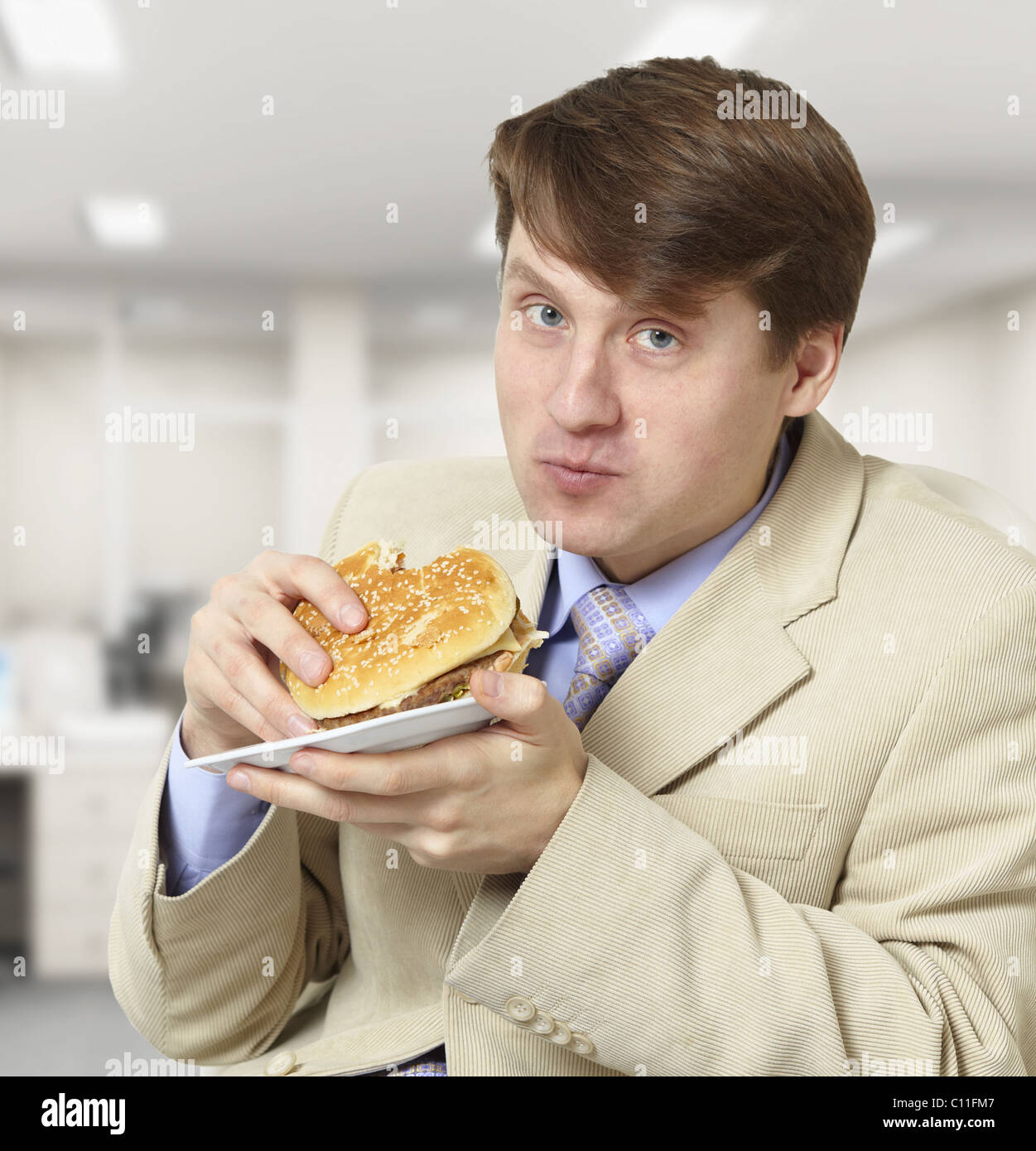 Young businessman is the dinner Stock Photo
