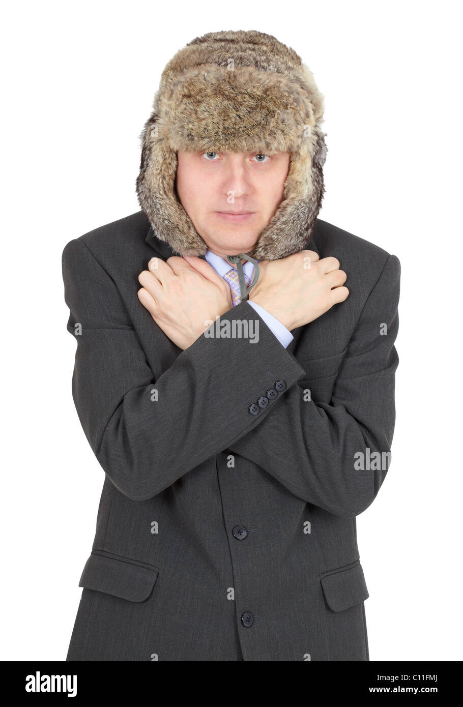Hoarse waggish young man in fur hat Stock Photo