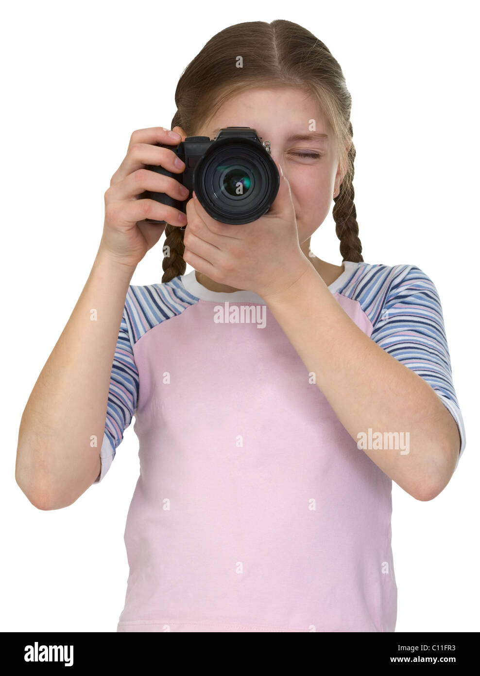 Little girl with camera isolated on white background Stock Photo