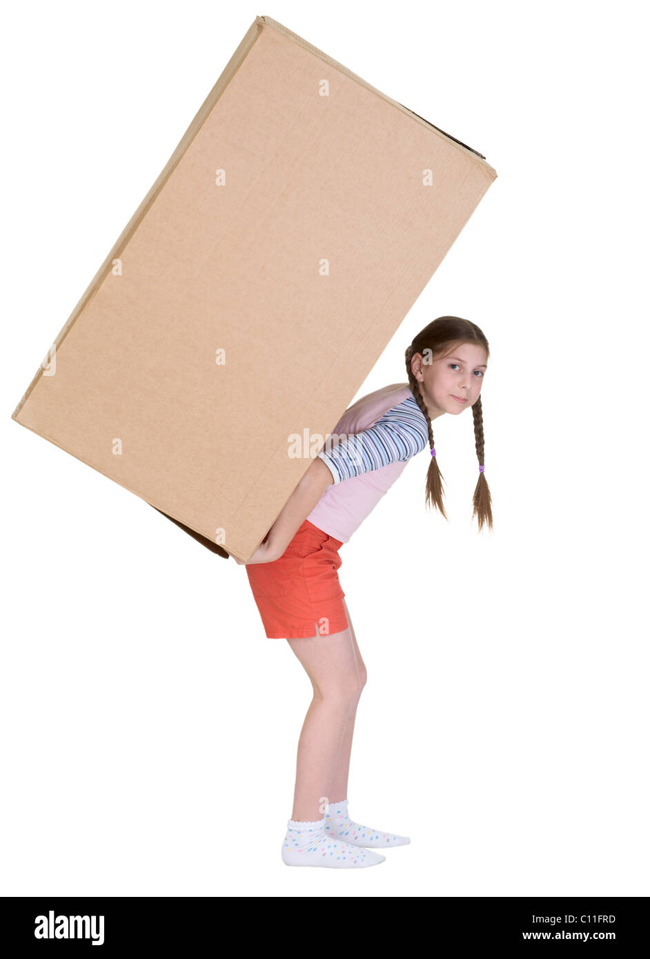 Little girl has large cardboard box Stock Photo