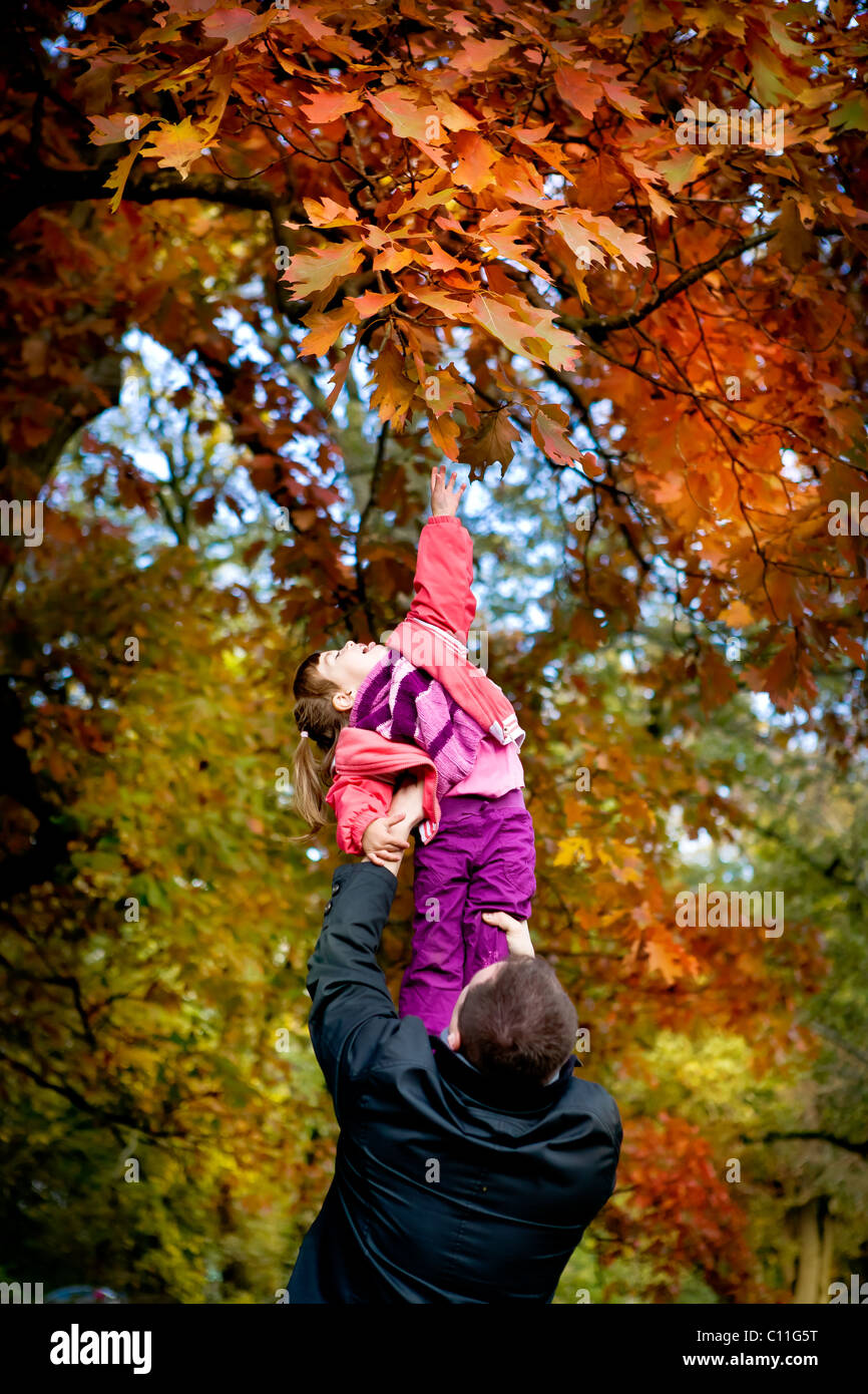 little girl in the autumn park Stock Photo - Alamy