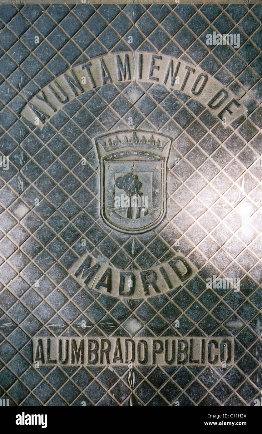 Manhole cover in Madrid, Spain Stock Photo