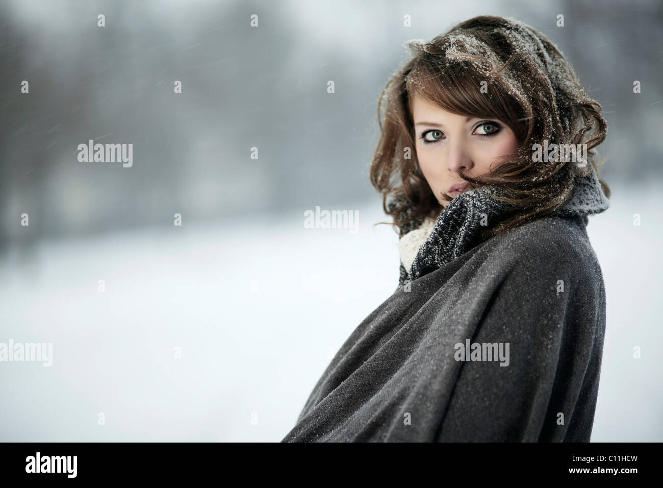 Young woman in snow, portrait Stock Photo - Alamy